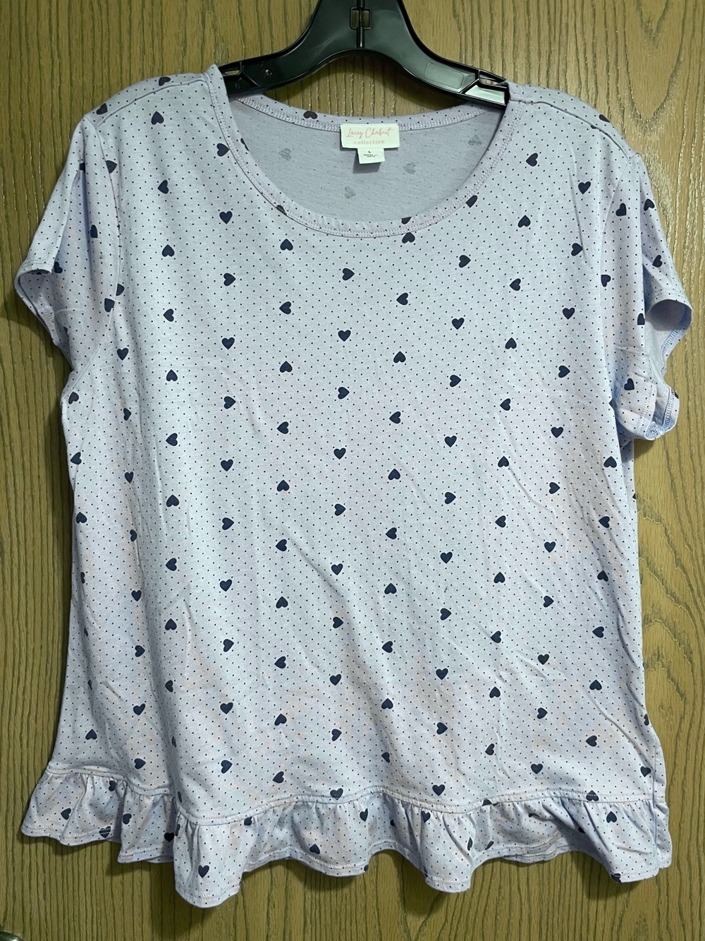 Lacey Chabert Light Blue Tee with Heart Print and Ruffle Hem